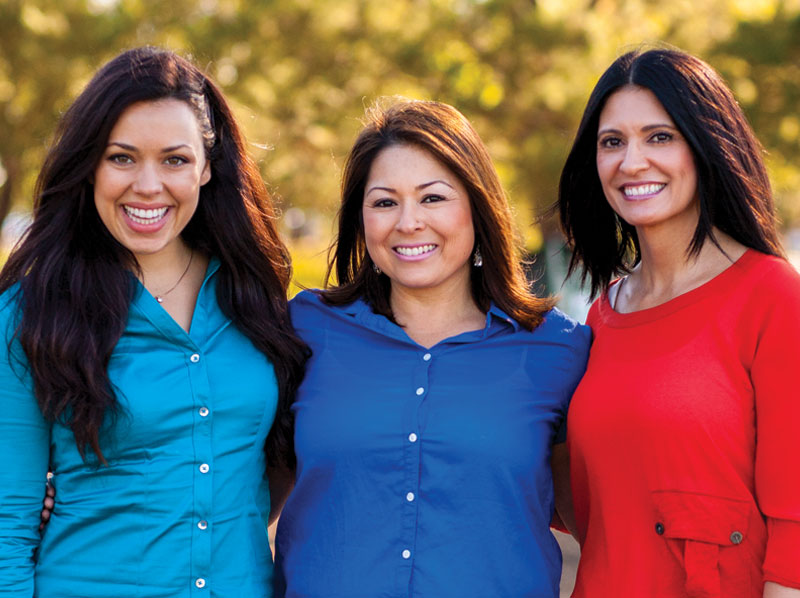 three smiling ladies